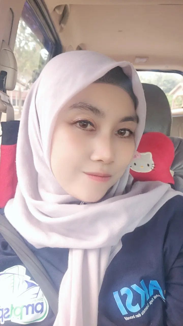 Risnawati, SE